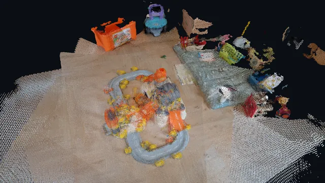 A toy construction set rebuilt as a 3D point cloud from nine phone photos