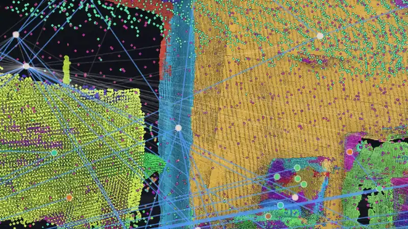A segmented indoor scan with a scene graph drawn over it, white dots sitting on each object and pale blue lines joining the ones that relate to each other.